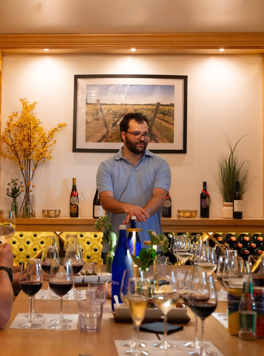 Zach hosting a guided wine tasting