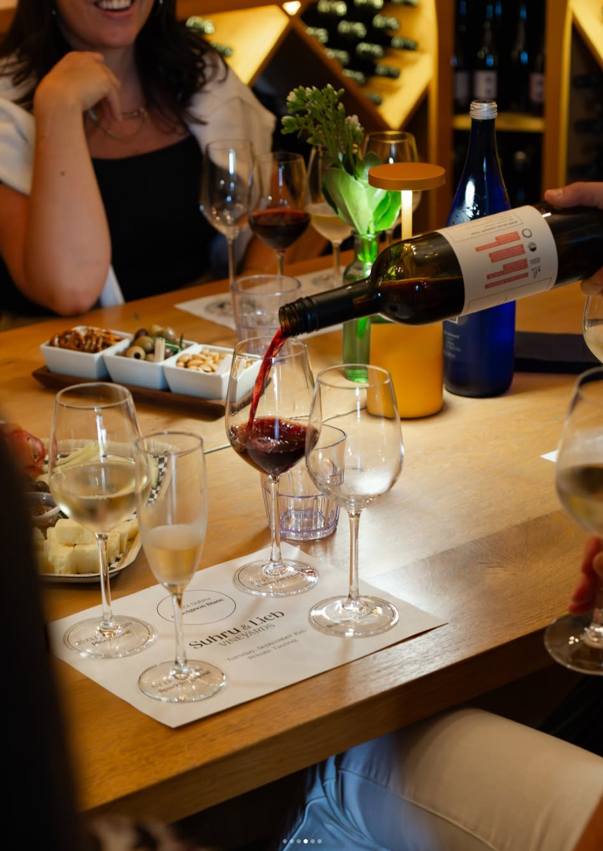 Wine tasting setup with guests